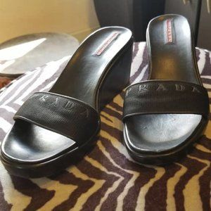 Prada logo slides